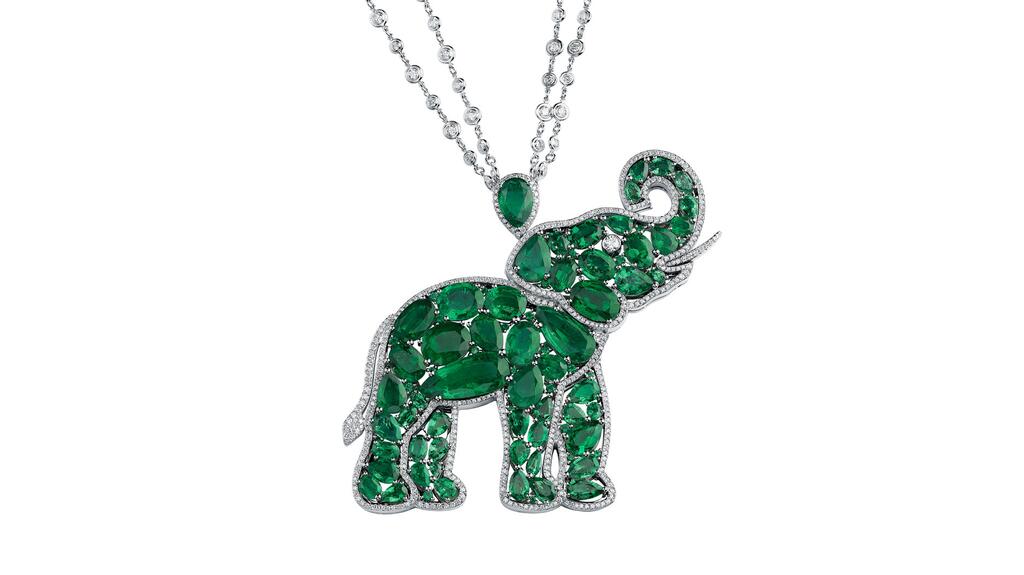 A pendant shaped like an elephant set with 24.97 carats of pear-shaped emeralds and 21.75 carats of oval-shaped emeralds, accented with brilliant-cut emeralds and diamonds Chopard Insofu elephant pendant